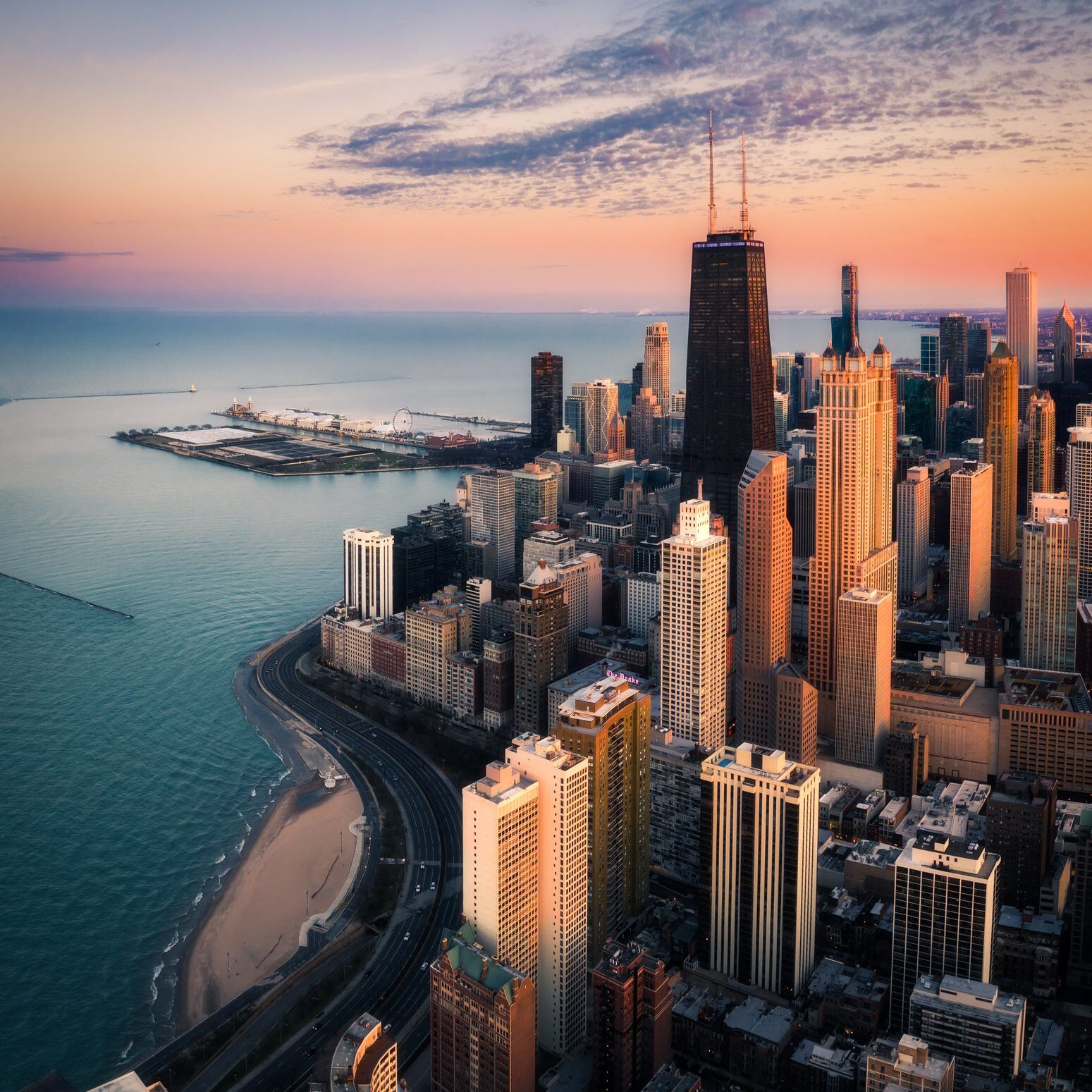 Aerial view of Chicago Gold Coast skyline with colorful sky